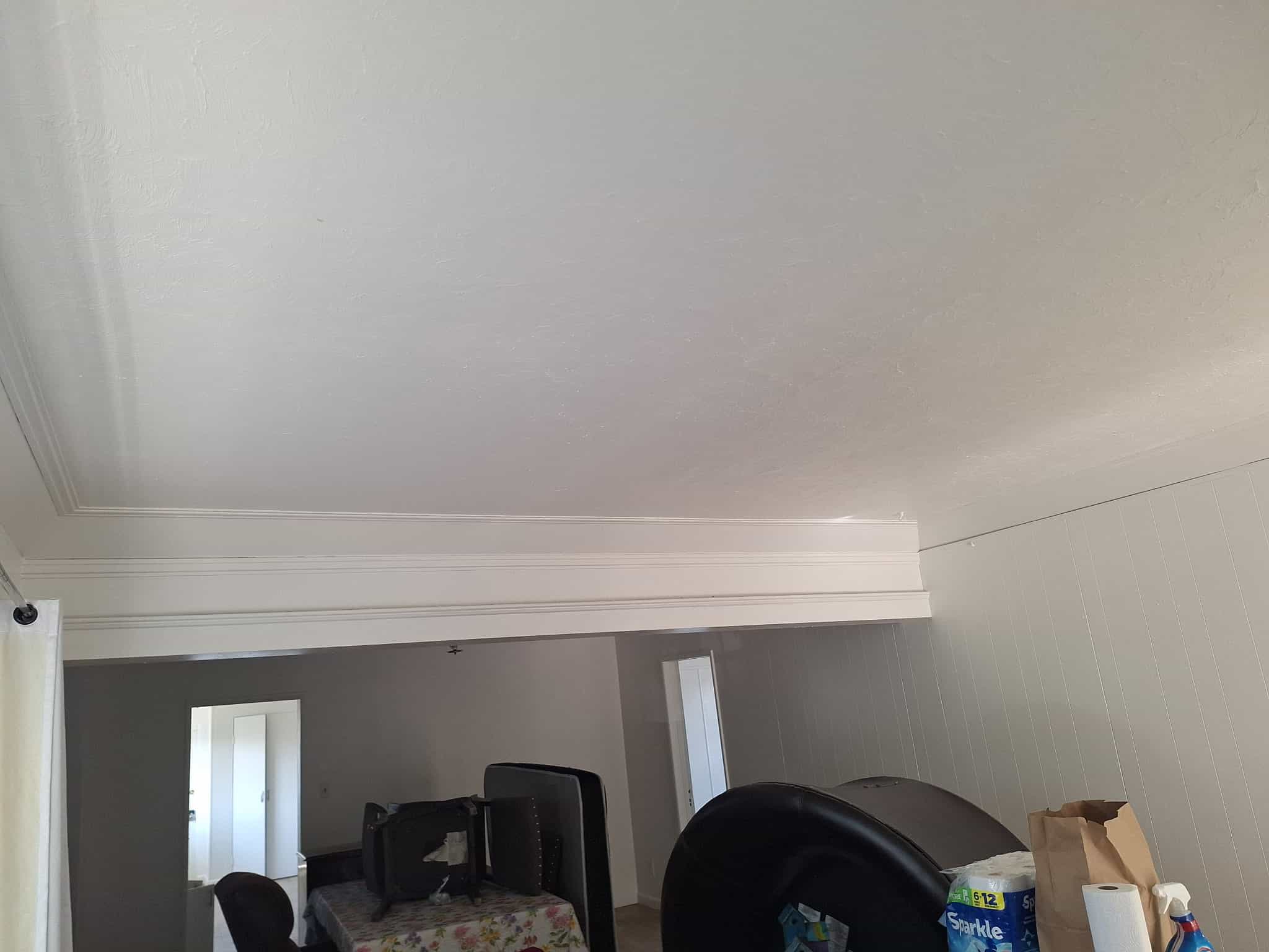 Finished smooth ceiling after popcorn removal
