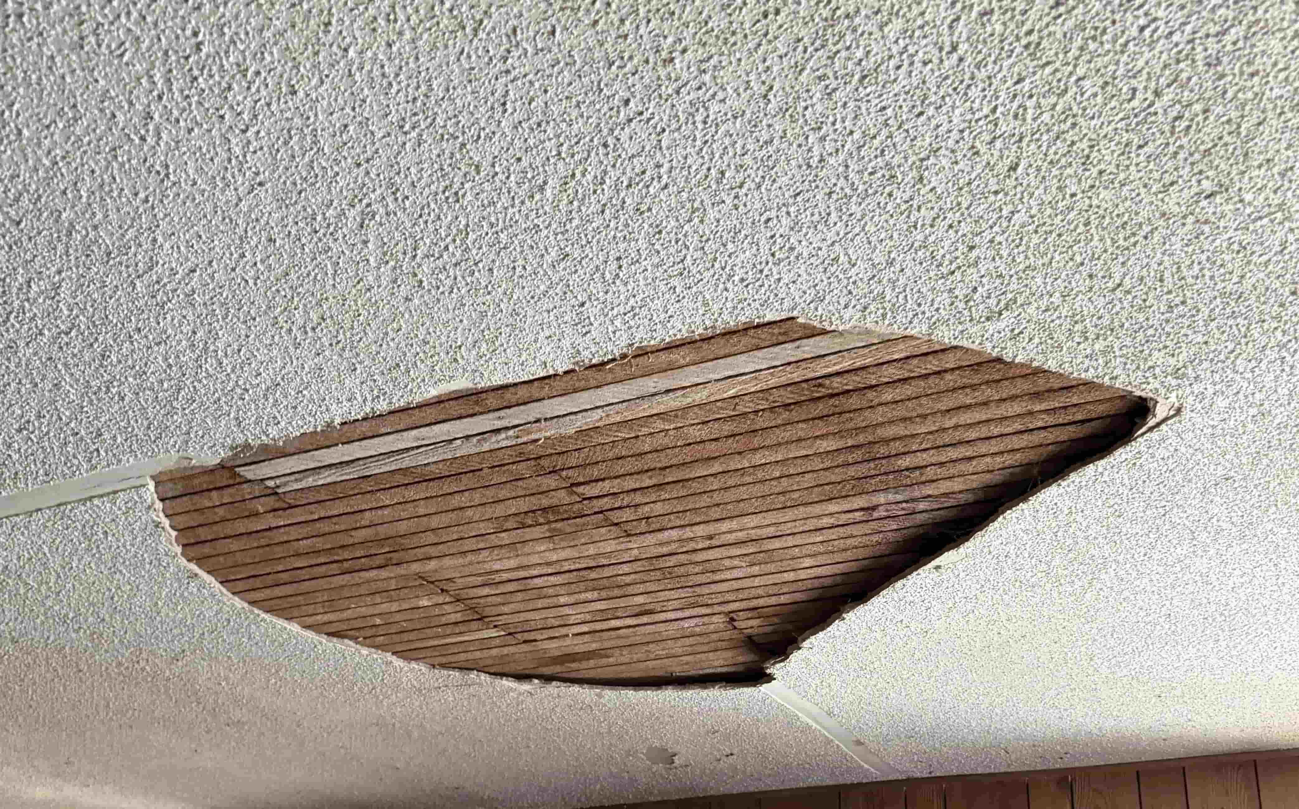 Hole in a ceiling ready to be patched in a San Diego home